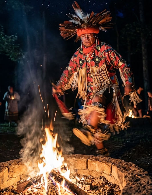 Uqualla leading a fire ceremony